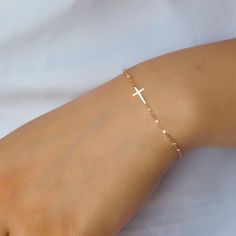 Cute and delicate Cross bracelet, available in sterling, gold, or rose gold.  Will be gift wrapped and ready for gifting.  Length is adjustable. Tiny Cross Bracelet - Mini Cross Bracelet, Confirmation gift for girl, Christmas gifts for her mom sister daughter, Birthday gifts, CR04BS Gold Charm Bracelet Gift, Dainty Rose Gold Bracelets For Personalized Gift, Dainty Rose Gold Bracelet For Personalized Gift, Custom Rose Gold Dainty Bracelet, Adjustable 14k Gold Charm Bracelet Gift, Dainty Hypoallergenic Rosary Bracelet Gift, Dainty Rose Gold Rosary Bracelet Gift, Dainty Rose Gold Rosary Bracelet, Personalized Delicate Name Bracelet As A Gift