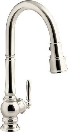 a kitchen faucet with two handles and nozzles on the side,