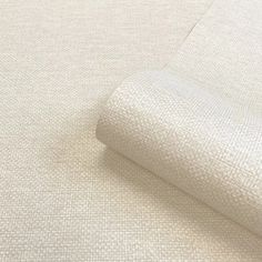 a close up view of a white fabric