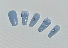 Hello! I hope you can find a style that you like in my store!  💅 Materials that are used:     I use the highest quality Korean nail materials to ensure that the nails last for a long time and are reusable. These include brands like Yogurt Korea, Dgel, Hoholee, Nailbayo, etc.     The nail tips that I use are also high-quality to make sure that your nails are sturdy and do not bend while wearing them!  What's included in a nail set:      - 10 nails of your size      - 2  additional replacement nails       - Nail glue (lasts 2-3 weeks)      - Nail tabs (lasts 1-3 days)      - Cuticle stick       - Alcohol prep pad      - Buffer/ Nail file      - Instructions on how to apply nails ❤️ Shipping/ Processing:     All of my nails are handmade with love meaning they will take a few days to be made! Blue Ribbon Nails, Nails With Ribbon Charm, Navy Blue Douyin Nails, Blue Rhinestone Nails, Blue Xiaohongshu Nails, Nail Designs With Bow Charms, Korean Nails, Meaning Of Love, Birthday Nails