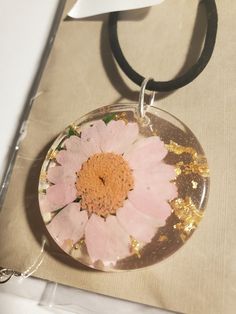 Baby pink flower with gold leaf foil in resin Adjustable Pink Flower-shaped Necklace, Pink Adjustable Flower Shaped Necklace, Pink Adjustable Flower Pendant Necklace, Handmade Pink Flower-shaped Necklace, Pink Flower-shaped Resin Jewelry, Pink Flower Charm Pendant Necklace, Handmade Pink Pendant Flower Necklace, Pink Flower Necklace For Gifts, Pink Flower Necklace For Gift