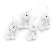 four white teddy bears are hanging from strings on a white background with black eyes and ears