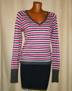 Elegant sweater with horizontal stripes, gray white and pink color, with v-neck, and particular high cuff in the long sleeve. Marked large size Material: 80% viscose, 15% nylon, 5% elastane Length from shoulder to hem 65 cm. In good vintage condition. ❤️If you love real vintage, take a look at my sister and friend shop!! Enjoy!! www.etsy.com/it/shop/OldVintageStories www.etsy.com/it/shop/Reinayestrellas Striped Fitted V-neck Sweater, Casual Striped V-neck Sweater With Long Sleeves, Casual Striped Long Sleeve V-neck Sweater, Winter Striped Long Sleeve V-neck Sweater, Winter Striped V-neck Sweater With Long Sleeves, Striped Long Sleeve V-neck Sweater For Winter, Winter Striped V-neck Long Sleeve Sweater, Fitted Striped V-neck Sweater, Stripes Sweater