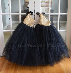 "Such a striking tulle dress! It's created in our true gold sequins with a black ribbon tie and black tulle skirt. The dress opens and closes at the top of the right shoulder. The bodice is fully lined. We offer the following sequin colors: gold, light gold, rose gold, blush pink, champagne, silver, white and black WANT A SEWN IN SLIP TO LINE THE TUTU? https://www.etsy.com/listing/125566641/add-a-slip-to-the-tutu-dress-sewn-in At checkout, please give us the following information: HOW TO ORDER: Glamorous Gold Tulle Dresses, Black Tulle Dress For Dress-up, Black Dress With Tulle Skirt For Dress-up, Elegant Fitted Gold Tutu Dress, Gold Tutu Dress With Sequins For Dress-up, Gold Sequined Tutu Dress For Dress-up, Fitted Gold Tulle Tutu Dress, Gold Glitter Tulle Dress For Dress-up, Gold Fitted Tutu Dress For Dress-up