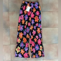 Brand New With Tags, Never Been Worn. Elastic Waist Band And Super Stretchy Throughout Retro Relaxed Fit Pants For Spring, Retro Black Summer Bottoms, 90s Style Pink Wide Leg Pants, 90s Style Black Summer Pants, Black 90s Style Summer Pants, 90s High-waisted Pants For Spring, 90s Style High-waisted Pants For Spring, Retro Pink Bottoms With Floral Print, 90s Inspired Fitted Bottoms For Spring