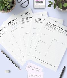 the printable project planner is next to some pens and pencils on a table