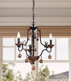 The Old-World Traditional look of our Colonial Charm Collection by Minka-Lavery combines wood and steel for an earthly appearance. Designed in Old World Bronze with Walnut Accents and comes in three different chandelier sizes which will accommodate your home and office décor needs and wants. Perfect for living or dining spaces and adds to the ambiance in bedrooms or even hallways - adding style without overwhelming your existing decor. The chandeliers are engineered to allow adjustable hanging h Classic Chandelier, 3 Light Chandelier, Minka Lavery, Beaded Chandelier, Residential Lighting, Chandelier Style, Wood Lamps, Black Chandelier, Light Chandelier