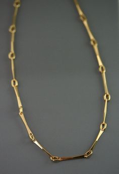 This handcrafted chain is of a big simplicity with these lines and these pure curves, drawn and made carefully to my workshop ; all the rings are welded one by one. The style is subtle and modern and will make a beautiful passkey for a smart holding look or relaxed one. This jewels is made of solid gold, 10 k or 14 k.  A beautiful present for the birthday, Mother's Days, marriage, Christmas or to offer itself to oneself! return to my shop : https://www.etsy.com/ca/shop/stephanielemelin?ref=listing-shop2-all-items-count#items Elegant Cable Chain Necklace In Recycled Gold, Elegant Recycled Gold Chain Necklace, Minimalist Yellow Gold Oval Link Chain Necklace, Minimalist Long Yellow Gold Chain Necklace, Minimalist Yellow Gold Long Chain Necklace, Minimalist 14k Gold Formal Chain Necklace, Minimalist 14k Gold Formal Necklace, Modern Yellow Gold Long Chain Necklace, Minimalist Yellow Gold Oval Link Necklace