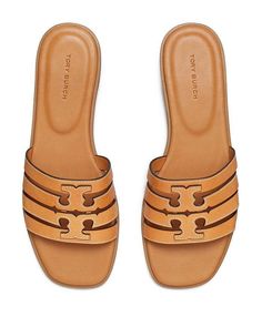 Fits true to size, order your normal size.Open toe.Slip on.Leather upper and lining, rubber sole.Imported.Web ID: 5020642 Tory Burch Shoes, Slide Sandals, Shoe Collection, Women's Shoes, Black Silver, Open Toe, Tory Burch, Rubber Sole, Womens Sandals