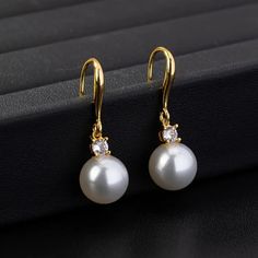 Brand New Women's Hanging Pearl & Diamond Earrings 18k Gold Plated Sterling Silver Genuine 2ct Lab Created Brilliant Cut Diamonds Real Natural Freshwater Pearls Measurements 1.4" Tall X .4" Wide Retail Price $300 Buy With Confidence From A Trusted Seller W/ A 99%+ Feedback Rating! A0284 (Id-1166-) Classic Round Diamond Earrings With Ear Wire, Elegant Gold Round Cut Earrings, Elegant Round Cut Gold Earrings, Classic Formal Earrings With Ear Wire, Elegant White Diamond Earrings With Elegant Design, Classic Round Diamond Earrings With Elegant Design, Elegant Earrings With Ear Wire For Anniversary, White Elegant Diamond Earrings, Formal Gold Pearl Earrings With Cubic Zirconia