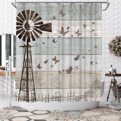 a shower curtain with a windmill and birds on it