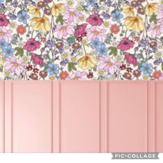 a pink wall with flowers on it next to a white and blue striped wallpaper