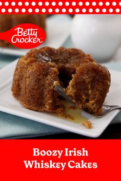 boozy irish whiskey cakes on a white plate with a bite taken out of it