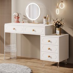 a white dressing table with drawers and a mirror