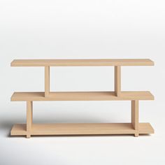 two wooden shelves sitting next to each other on a white surface with one shelf missing