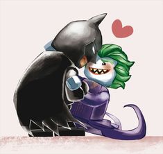 the joker and catwoman are hugging each other