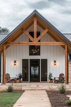 Open-concept barndominium living space with rustic floors, industrial fixtures, and contemporary furniture