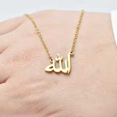 "Pendant written Allah in Arabic, Muslim necklace, delicate Allah necklace, Islamic necklace, gold plating-goldfield, special gift. Free international shipping The chain is made of high quality gold plating. The size of the pendant is 0.60 inches. The length of the chain - 15 inches + 3 inches increase. Wearing necklace with the word \"Allah\" is way to show faith in God, identification with Islam and sacrifice to God. You will be very satisfied with our jewelry and you will not be disappointed. Add this simple yet stylish piece of jewelry to your collections, bold and confident. They really go with everything ∙ Metal type: gold plating. ∙ Stain resistance. ∙ Safe for sensitive skin. ∙ No allergens. without lead. In order to keep the item \"shiny\" for a long time, it is advisable to avoid Muslim Necklace, Islamic Necklace, Allah In Arabic, Allah Necklace, Jackson Family, In Arabic, Islam Facts, Perfect Gift For Mom, Faith In God