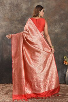 Be vision of elegance on special occasions in this traditional red silk saree. The saree is enhanced with overall heavy zari work. It comes with a matching blouse piece. Disclaimer: The shown stitched blouse on the model is for display purpose only. The saree comes with a matching blouse piece and finished with fall and piko. Red Katan Silk Pre-draped Saree For Designer Wear, Designer Red Paithani Silk Pre-draped Saree, Red Art Silk Pre-draped Saree With Self Design, Red Paithani Silk Pre-draped Saree With Pallu, Red Tussar Silk Designer Pre-draped Saree, Red Tussar Silk Pre-draped Designer Saree, Red Paithani Silk Pre-draped Saree With Unstitched Blouse, Red Paithani Silk Pre-draped Saree With Cutdana, Red Pre-draped Saree With Unstitched Blouse In Paithani Silk