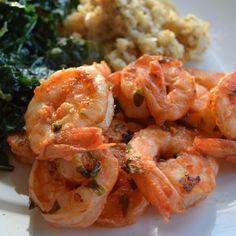 shrimp, spinach and cauliflower on a white plate