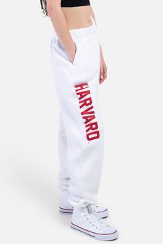 A must have! Stay comfy all season long in the our Harvard Basic Sweatpants. These sweatpants feature a high-rise fit, elastic waistband, side pockets, and cuffed ankles. High-rise Elastic waistband Side pockets Cuffed ankles 75% Cotton, 25% Polyester Machine washable Size + Fit Wearing size S Height: 5'5" P.S. We'd love to see you repping this style! Don't forget to tag us to be featured ♡ *All MTO orders are made specifically for you. Please allow 3-6 business days for order to be processed an Basic Sweats, Vinyl Logo, Logo Application, Fleece Sweatpants, Transfer Vinyl, Heat Transfer Vinyl, Heat Transfer, Don't Forget, Pajama Pants