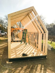 a house being built in the middle of a field