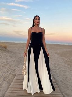 Elegant Black White Contrasting Women Sling Dress Fashion Backless Sleeveless High Waist Maxi Dresses Female Party A-line Robes




 


Measurement In CM



	
		
			
			size

			
			
			S

			
			
			M

			
			
			L

			
		
		
			
			Bust [cm]

			
			
			80

			
			
			84

			
			
			88

			
		
		
			
			Dress Length [cm]

			
			
			122

			
			
			123.5

			
			
			125 High Waist Maxi Dress, Maxi Vestidos, Tank Dresses, Backless Maxi Dresses, Sling Dress, Vestidos Vintage, White Maxi, Dress Elegant, Sleeveless Maxi Dress