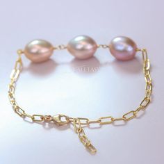 Pearl Bracelet Gold Filled Pink Pearl Peach Pearl High Luster Pearl Chain Bracelet Metallic Freshwater Pearl Bracelet Pink Pearl Bracelet (34297 - 3) Elegant Pink Jubilee Chain Bracelet, Elegant Handmade Rose Gold Chain Bracelet, Elegant Adjustable Pink Chain Bracelet, Elegant Pink Chain Bracelet With Adjustable Chain, Elegant Pink Adjustable Chain Bracelet, Elegant Pink Chain Bracelet, Elegant Pink Pearl Bangle Bracelet, Swan Bracelet, Pink Pearl Bracelet