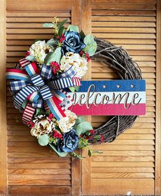 a patriotic wreath with the word welcome on it