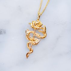 24K Gold Plated Snake and Rose pendant necklace. The rose and snake design are the ultimate symbol of temptation. They also represent loss of innocence and beauty. Chain length 16 inches / 40.6 cm 18 inches / 45.7 cm 23.5 inches / 60 cm 31.5 inches / 80 cm Available in 925 Sterling Silver https://etsy.me/35Q2gAy Every piece is handcrafted in Bali and made with Intention, Love, and Soul so that it can be felt by its wearer and ultimately change our energy and lives in a positive way. Each with it Hand Sculpture, Snake Jewelry, Snake Necklace, Rose Pendant, Rose Necklace, Rose Jewelry, Classy Jewelry, 925 Sterling Silver Chain, Fantasy Jewelry