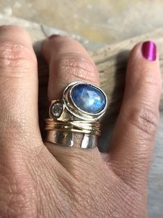 Moonbeams Ring | Etsy Unique Moonstone Ring With Gemstone Accents For Anniversary, Bohemian Rings With Gemstone Accents For Anniversary, Bohemian Anniversary Rings With Gemstone Accents, Celestial Ring With Gemstone Accents, Celestial Jewelry Ring With Gemstone Accents, Fusion Style Gemstone Accents Jewelry For Anniversary, Sapphire Gemstone Fusion Jewelry, Fusion Style Oval Moonstone Ring For Anniversary, Fusion Style Jewelry With Gemstone Accents For Anniversary