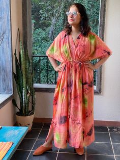 I made this caftan dress from a beautiful watercolor pattern and is available in many colors. I used the softest mulmul cotton fabric to make this. It is extremely soft and it gets softer with every wash. It is so free flowing, that it will make you feel as if you aren't wearing anything at all ;) The beauty of the Kaftans is they will fit everyone so no need to worry about the size et all. All my Kaftans have deep necks(11-12 inches) so will fit all head sizes. However, the length of my kaftans Multicolor V-neck Kaftan With Batik Print, Multicolor Printed Dresses For Loungewear, Printed Multicolor Dresses For Loungewear, Casual Pink Dress With Kimono Sleeves, Long Multicolor Kaftan For Loungewear, Multicolor Tunic Maxi Dress For Summer, Summer Multicolor Tunic Maxi Dress, Vibrant Short Sleeve Maxi Dress For Vacation, Multicolor Batik Print Kimono For The Beach