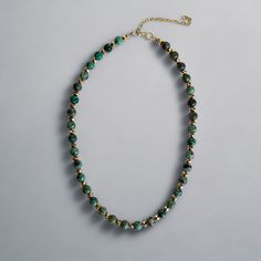 Discover the sophisticated elegance of African Turquoise with this beaded necklace, a perfect blend of traditional charm and contemporary style. This piece features an array of 8mm African Turquoise beads, known for their unique, earthy hues and intricate patterns. The necklace is designed with 6mm gold-plated spacers, delicately alternating between the turquoise beads. These gold accents add a touch of luxury, making the necklace versatile for both casual and formal wear. 8mm African Turquoise 6mm gold-plated faceted spacers 18" necklace with a 3" extender chain lobster clasp closure Handmade in Lincoln, Nebraska Style it with a chunky gold chain and a long pendant for the perfect layered #neckmess. Chunky Gold Chain, Turquoise Bead Necklaces, African Turquoise, Long Pendant, Turquoise Beads, Gold Accents, Gold Chains, Fashion Statement, Contemporary Style