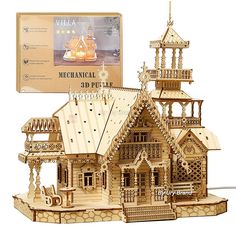 a wooden model of a house with a clock on the front and side of it