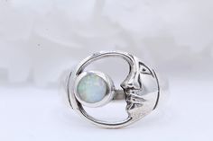 Metal Type: Sterling Silver Metal Stamp: 925 Gemstone Type: Lab White Opal Gemstone Shape: Round Gemstone Creation Method: Simulated Ring Measurements: 12.7mm Available in different metal colors and stone colors as well. Please message me for inquiry! Zodiac Sign Art, Opal Art, Engagement Rings Twisted, Art Deco Ring, Sterling Silver Bands, White Opal, Blue Opal, Opal Gemstone, Silver Blue