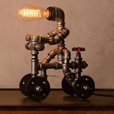 Industrial Wrought Iron Robot Design Table Lamp - Water Pipe 1/3-Bulb Bedroom Standing Light Iron Robot, Robot Lamp, Pipe Decor, Standing Table, Pipe Lighting, Pipe Furniture, Steampunk Lamp, Pipe Lamp, Art Deco Table