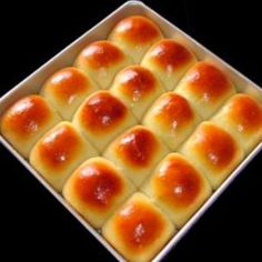 a pan filled with lots of food on top of a table