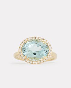 18K Yellow Gold Aquamarine Oval Ring with Pave Setting, .99 TCWOrnament is 5/8 Inch Long x 1/2 Inch Wide Style# YRPOAQW Luxury Oval Cluster Ring In Yellow Gold, Oval Sapphire Ring With Halo Setting In 14k Gold, Oval Yellow Gold Cluster Ring With Accent Stones, Luxury Oval Yellow Gold Topaz Ring, Luxury Yellow Gold Oval Topaz Ring, Oval Sapphire Ring With Halo In 14k Gold, Oval Sapphire Ring With Halo Design In 14k Gold, Timeless Yellow Gold Oval Halo Ring, Yellow Gold Oval Halo Ring With Center Stone