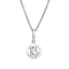 Estate Cartier diamond "13" lucky charm & necklace crafted in 18 karat white gold. 14 diamonds total an estimated 0.10 carats (estimated at G-H color and VS1-2 clarity). The diamond set lucky "13" charm come with a 17" Cartier 18k white gold chain. The necklace is great worn alone or layered with your fine necklaces from any era.  The necklace is in very good original condition and was cleaned and polished. Particulars: Weight: 10.9 grams Stones:  14 diamonds total an estimated 0.10 carats (estimated at G-H color and VS1-2 clarity). Size & Measurements: The necklace measures 17 inches. The '13' charm measures 1 x 1/2 inch (including the bale). Metal & Hallmark: 18k white gold. The charm and necklace are each hallmarked "750" for 18 karat gold and "Cartier" along with the serial number. Luxury Silver Diamond Charm Necklace, Luxury Silver Diamond Charm Necklaces, Classic White Gold Charm Necklace For Anniversary, Luxury Silver Charm Necklace For Anniversary, Classic White Gold Charm Necklaces For Anniversary, Luxury Silver Charm Necklaces For Anniversary, Classic Diamond Charms Necklace, Classic Diamond Necklace With Charms, Classic Diamond Necklaces With Charms