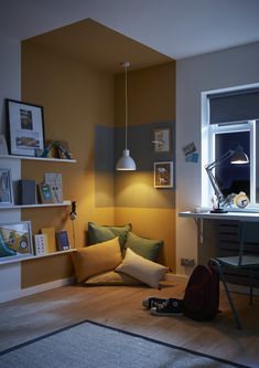 a living room with yellow walls and furniture