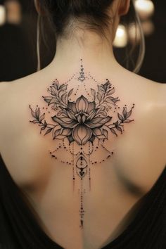 Detailed blackwork lotus flower tattoo with foliage on a person's upper back. Lotus Flower Tattoo Back Shoulder, Tattoos On Thigh For Women, Creative Back Tattoos, Mandala Tattoo On Back, Back Tattoo Designs For Women, Back Tattoo Inspiration, Mandala Back Tattoo, Back Tattoo Ideas For Women, Back Tattoo For Women