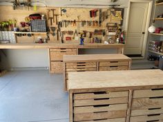 the workbench has many drawers and tools in it