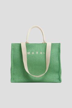 Far more than your typical beach bag marni’s raffia tote comes in a minty kiwi green that's equally fit for the seaside or the city.  it’s incredibly spacious (and super packable) with soft canvas lining and an interior zip pocket - plus the cheeky embroidered logo that's a staple of this latest collection. carry it by the rolled top handles or the long shoulder straps. we consider this a vacation bag done just right - take it on the plane then straight to the beach.    product details    model: shmq0034u1    materials: 52% cotton 48% polyamide; lining: 100% cotton; trim: 100% calf leather    dimensions: 18" x 14" x 7½"    made in italy    about the designer    founded by consuelo castiglioni in 1994 italian label marni harnesses a rare amalgamation of enigmatic luxury and rich graphic rig Vacation Bag, Womens Designer Bags, Basket Bag, Womens Tote, Kiwi, Beach Bag, Creative Director, Calf Leather, Zip Pockets