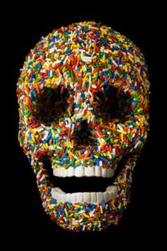 a skull made out of sprinkles and candy