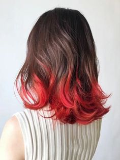 Dip dyed hair involves selectively coloring only the ends of hair strands, resulting in a gradient or ombre effect. During this technique, stylists commonly immerse or apply dye to the lower part of the hair, while keeping the roots in their natural color. The extent of contrast between the natural and dyed sections can vary, catering to individual preferences for either a subtle or bold transition. Red Tips On Light Brown Hair, Colored Hair Ends, Red Hair Ends, Red Dip Dye Hair, Kpop Hairstyles, Dip Dyed Hair, Dyed Ends Of Hair, Red Hair Tips