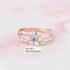 "♥ Family Birthstone Ring ♥ Customed by kids' birthstones, this beautiful and dainty ring is a perfect gift for your mom or your loved one. P R O D U C T ∙ I N F O * Material: Solid 925 Sterling Silver * Finishing: Silver - Yellow Gold - Rose Gold * Up to 5 stones * Each stone measures approx. 1/16'' (2mm) H O W * T O * O R D E R 1. Select the drop-down option you want 2. Please let us know the following information in the \"Add your personalization\" box or \"Note to Seller\" box: - The birthst Stackable Rings With May Birthstone For Birthday, Stackable May Birthstone Ring For Birthday, Stackable Round Birthstone Ring For Birthday, May Birthstone Stackable Ring For Birthday, Dainty Gemstone Rings For Birthday, Dainty Birthstone Ring For Birthday, Birthday Stackable Birthstone Rings, May Birthstone Ring With Bezel Setting For Birthday, Adjustable Stackable Rings For Birthday