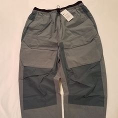 Ozone Blue Cargo Pants Size 36 With Drawstrings And Many Pockets Nike Functional Bottoms With Side Pockets, Nike Sporty Bottoms With Cargo Pockets, Nike Sporty Cargo Pants With Pockets, Nike Sporty Cargo Pants, Functional Nike Cargo Pants With Pockets, Nike Functional Bottoms With Cargo Pockets, Nike Functional Cargo Pants With Side Pockets, Nike Functional Cargo Pants With Pockets, Nike Athleisure Cargo Pants With Pockets