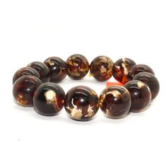 "This is a rosary/praying bracelet with natural solid brown white color amber beads. It uses a half-elastic string and no opening knot. Dimensions: bead dia 5/8\" , 13 beads , half elastic string. Inside circle approx dia 2.25\" , 48g Origin: China Material: natural amber Condition: natural pattern, no chip (buyers of Hawaii, Alaska, US Islands, and Canada pays the extra shipping cost). Insurance and handling charges are already included in the shipping cost. In store pick up is highly welcomed Spiritual Brown Rosary Bracelet With Beads, Spiritual Brown Stretch Bracelet With Polished Beads, Amber Hand-strung Stretch Bracelet With Round Beads, Brown Stretch Bracelet With Polished Beads As Gift, Brown Round Spiritual Stretch Bracelet, Spiritual Brown Round Stretch Bracelet, Spiritual Brown Stretch Bracelet, Nouveau Jewelry, Jewelry Diy Bracelets