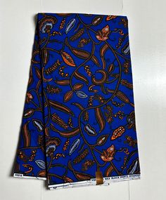 African  Ankara  Fabric  Per Yard or  6yards Material: 100% Cotton Print: Double - Sided Width:  46" Main Colors: Blue, Yellow, White FABRIC CUT: Purchase of  more than 1 yard,  will be cut as 1  continuous piece of fabric up to a maximum length of 6 yards.  MANUFACTURER's LABELS: All African fabric is sold with an adhesive Manufacturer label attached This timeless appeal & adorable, vibrant color African print fabric is perfect for making African Clothing, African Quilts, Upholstery, Home Décor, Unique Accessories and all types of Crafts and may have more colors than listed above Please be aware that  colors may appear slightly different due to your monitor's  settings. Traditional Blue Floral Print Fabric, Blue Ankara Fabric With Traditional Patterns, Blue Cotton Fabric With Traditional Patterns, Traditional Blue Batik Print Fabric, Blue Printed Ankara Fabric, Wedding Fabrics, African Quilts, African Outfits, African Ankara