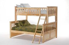 a wooden bunk bed with a green bedspread and two pillows on the bottom